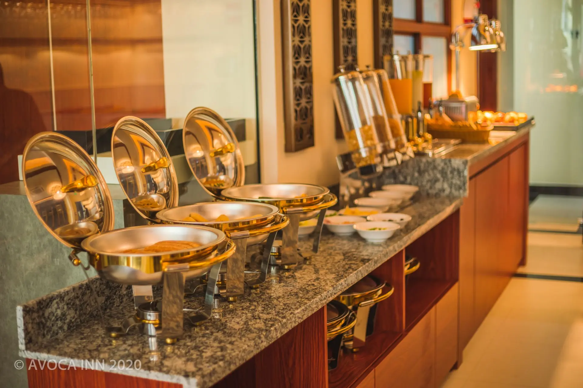 Avoca Inns breakfast buffet offers a tempting array of hot dishes, pastries, and fresh juices.