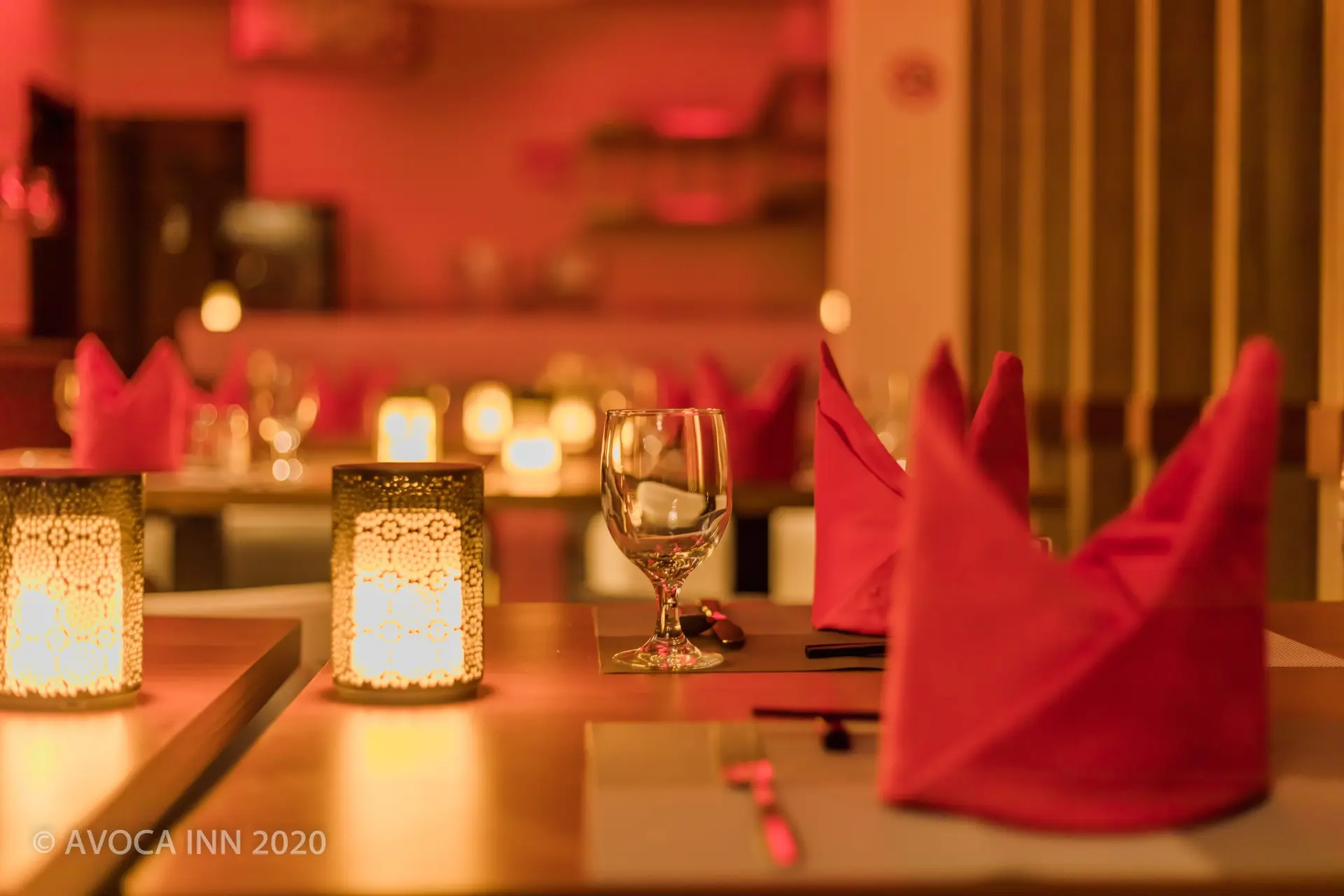 Elegant dining setup at Avoca Inn in 2020 invites guests to a warm, intimate culinary experience.