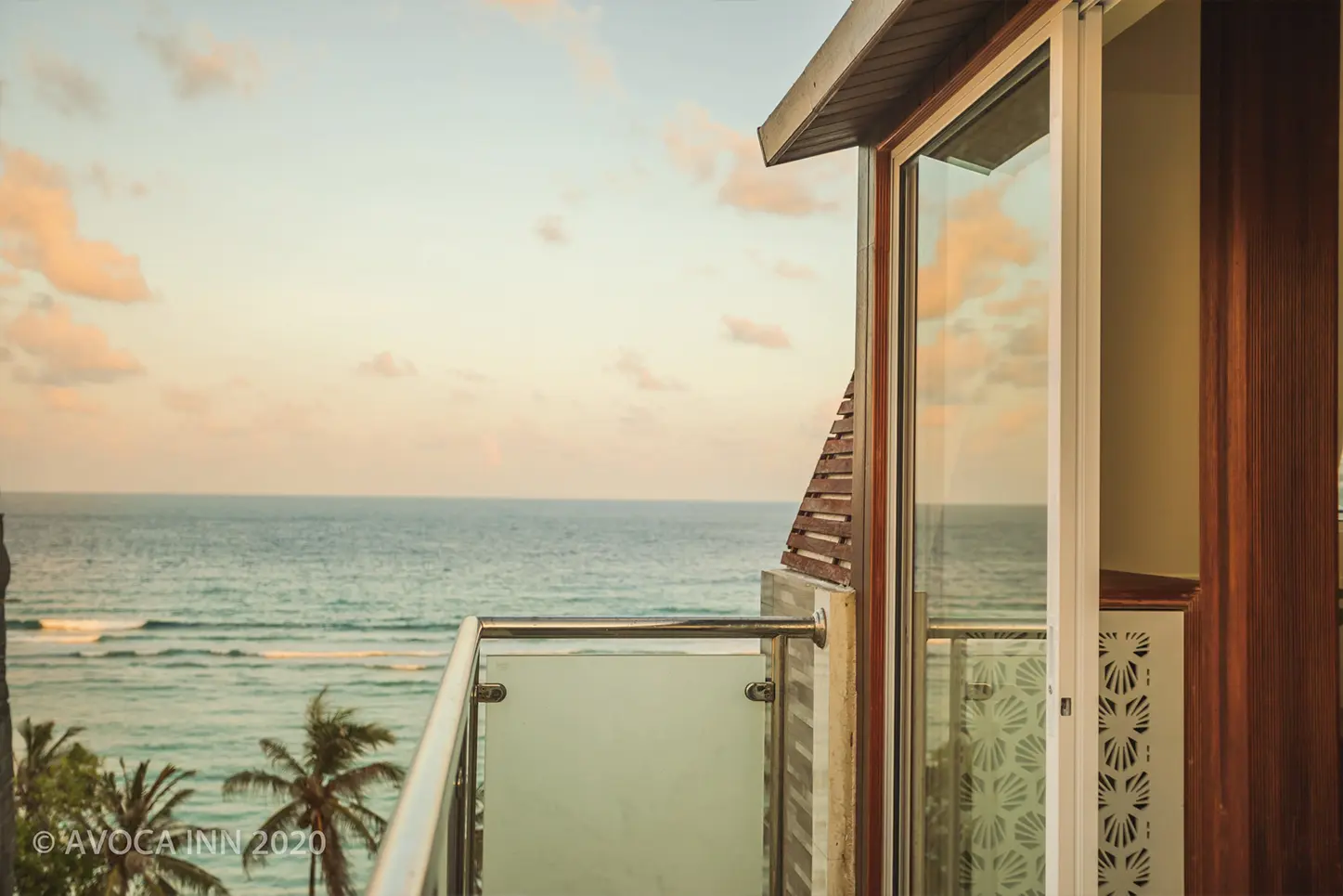Wake up to a stunning ocean view from your private balcony at Avoca Inn.