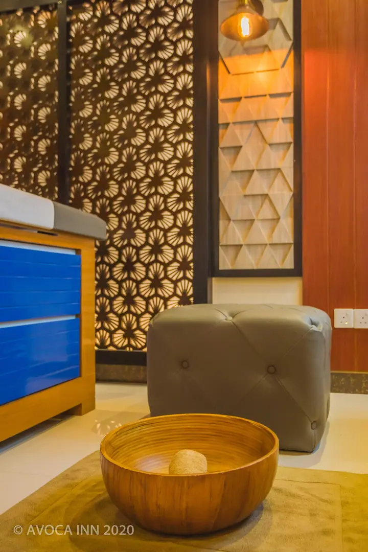 A serene spa scene features a foot soak setting with natural elements for relaxation and well-being.